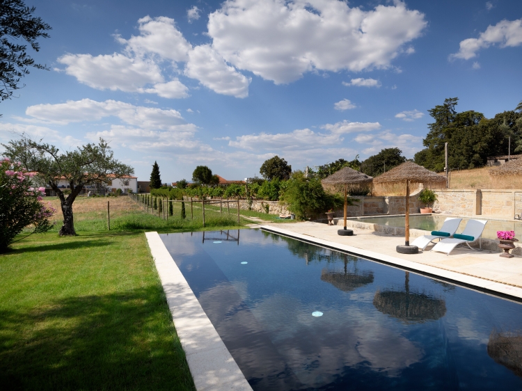 The swimming pool and the ancient stone tank