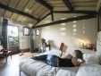Bedroom - mixing the traditional wood beam ceilings with funky details (Brentina Ovile)