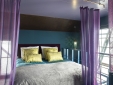 Escapada hotel grúa Faralda Amsterdam Holanda confortable cama descansar 