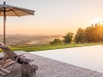 Outdoor Infinity-Pool with view to lake Chiemsee, open from end of april to end of october.